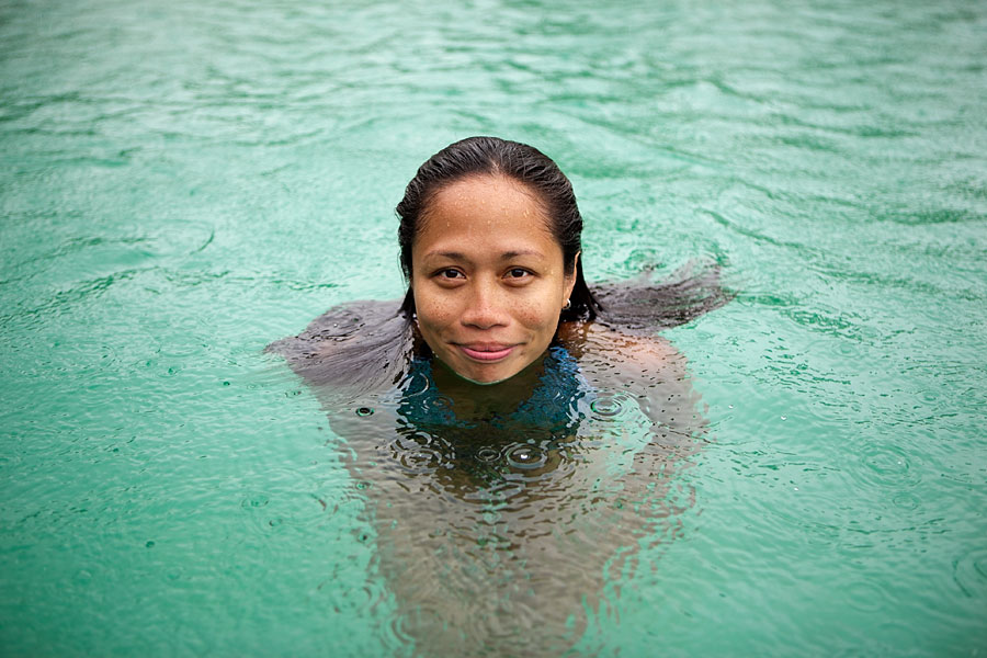 Monica in the Kapuluan Vista Resort pool during a rainstorm