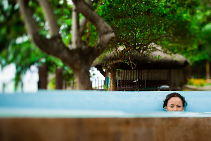 Raech in the diving gear cleaning pool, Mayumi Dive Resort, Anilao, Batangas, Philippines